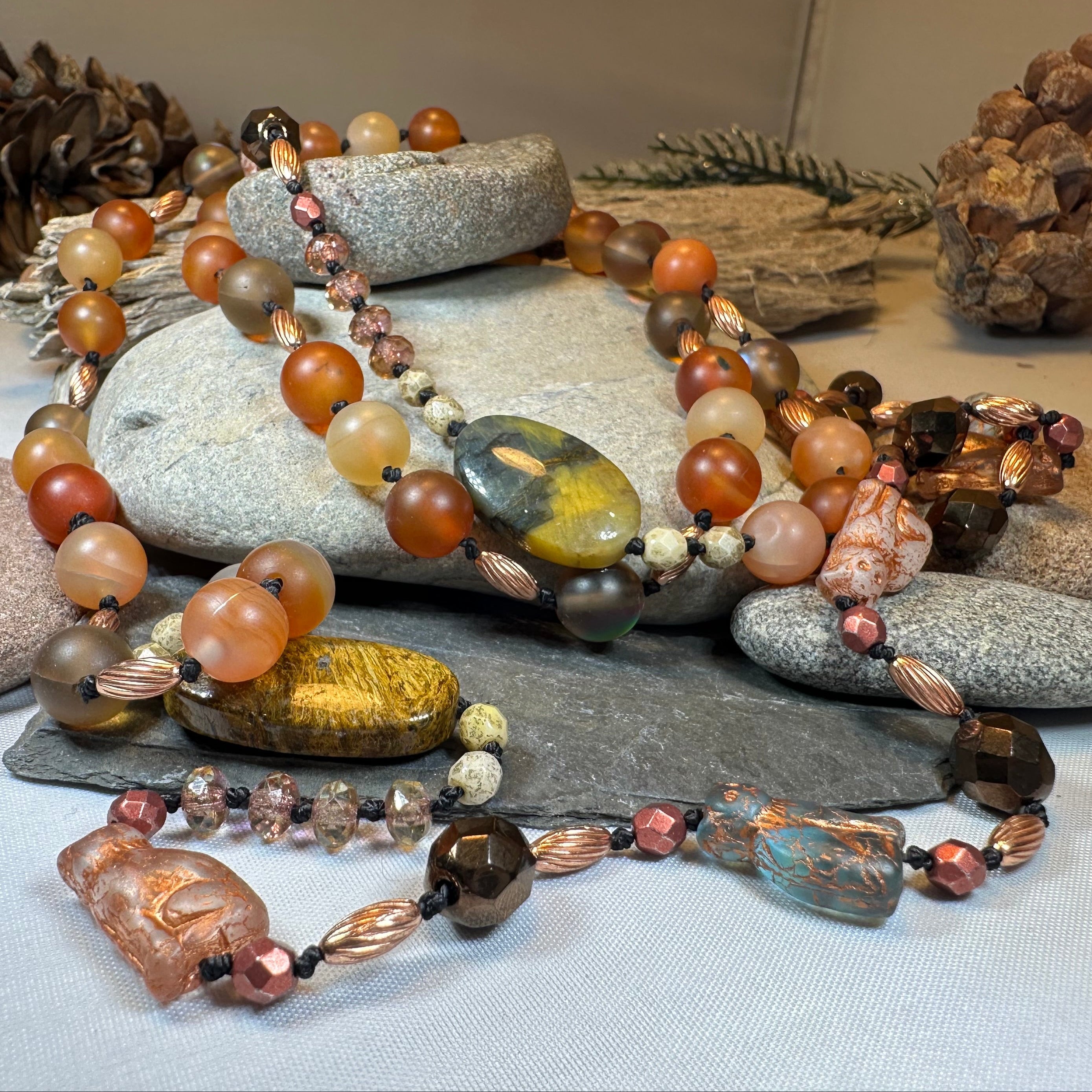 Copper Autumn Cat long necklace by Celtic Crystal Design Jewelry featuring a detailed cat pendant on a sleek necklet.