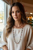 Copper Autumn Cat Long Necklace by Celtic Crystal Design Jewelry featuring a detailed cat pendant on a long chain.