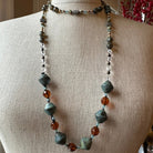 Celtic Crystal Design Jewelry Duneflower Mist long necklace with intricate Celtic-inspired pendant and delicate chain.