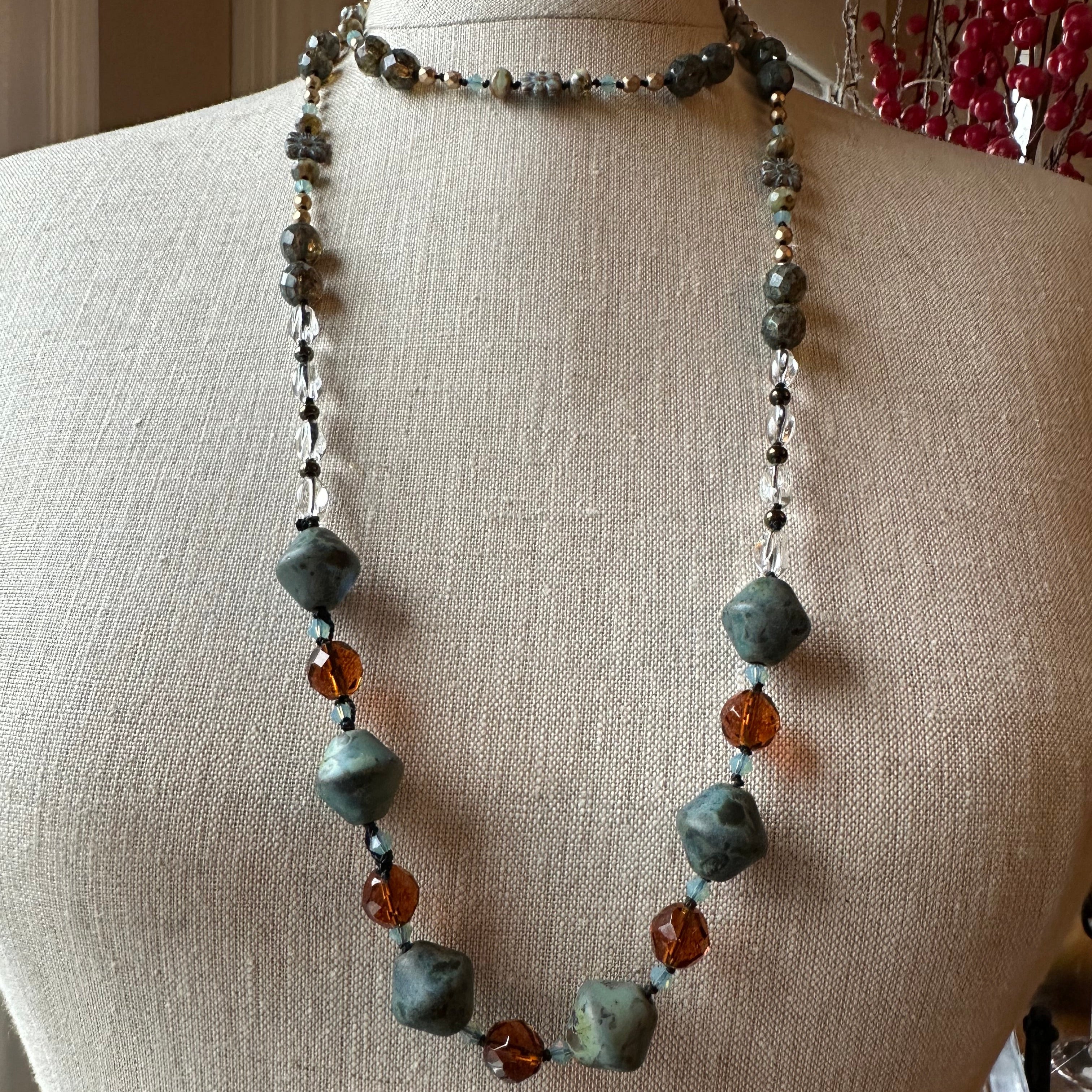 Celtic Crystal Design Jewelry Duneflower Mist long necklace with intricate Celtic-inspired pendant and delicate chain.