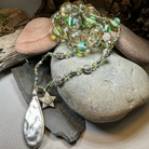 Elven Watersprite Seastar Necklet by Celtic Crystal Design Jewelry featuring a detailed sea star pendant on a delicate chain.