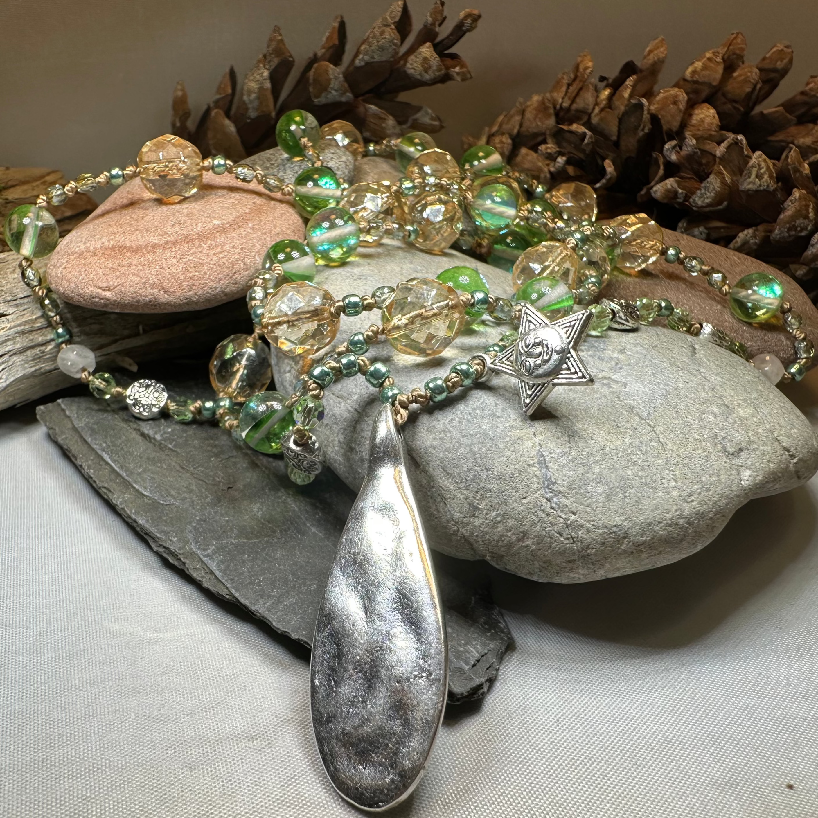 Elven Watersprite Seastar Necklet by Celtic Crystal Design Jewelry featuring a delicate, intricate starfish pendant on a fine chain.