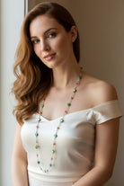 Pink Beach Blossom long necklace by Celtic Crystal Design Jewelry, featuring a delicate floral-inspired pendant on a fine chain.