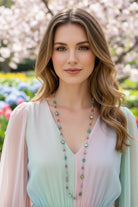 Pink Beach Blossom long necklace by Celtic Crystal Design Jewelry featuring a delicate, colorful beach-inspired pendant.