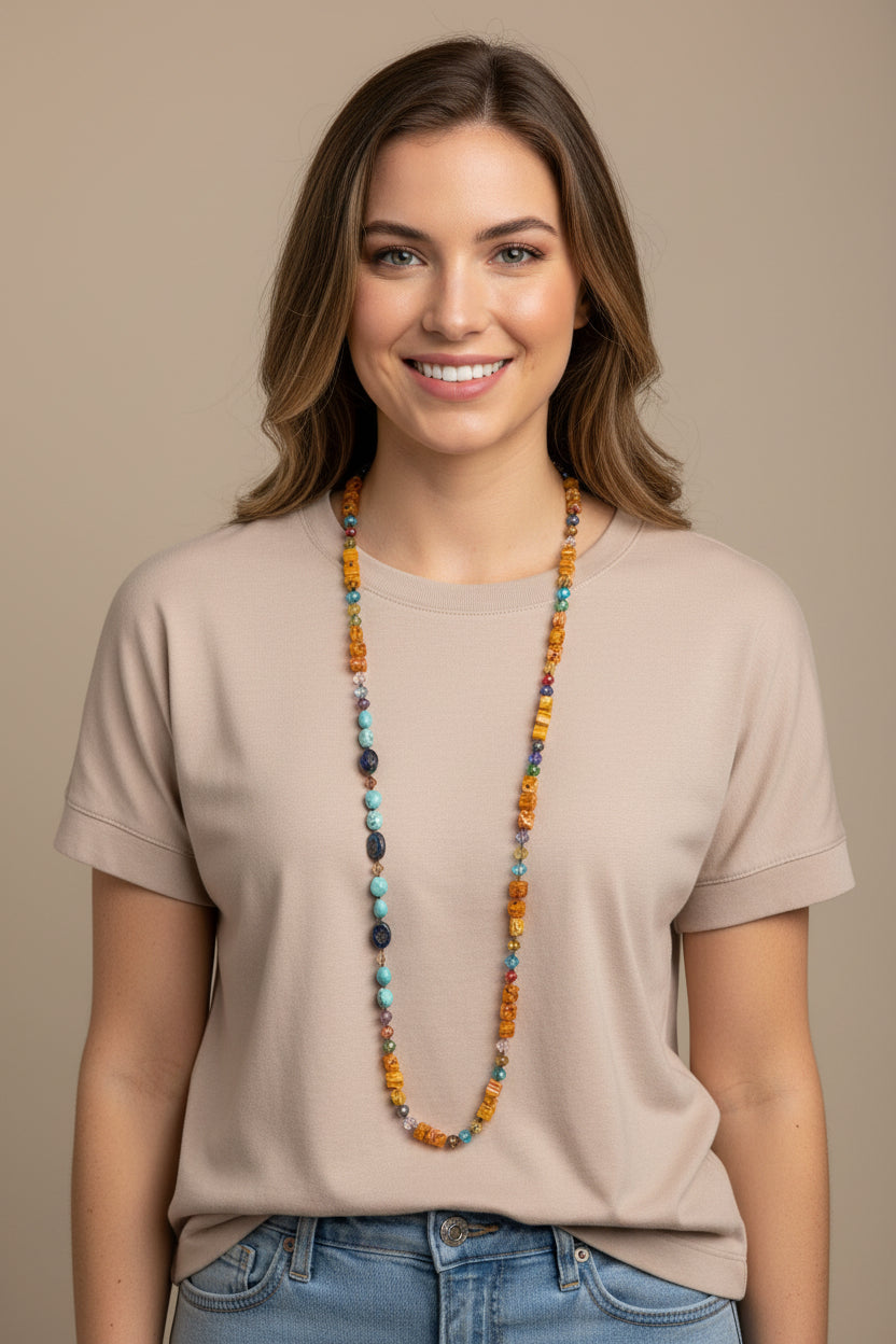 Celtic Crystal Design Jewelry tropical carnival long necklace with colorful beads and intricate Celtic-inspired pendant.