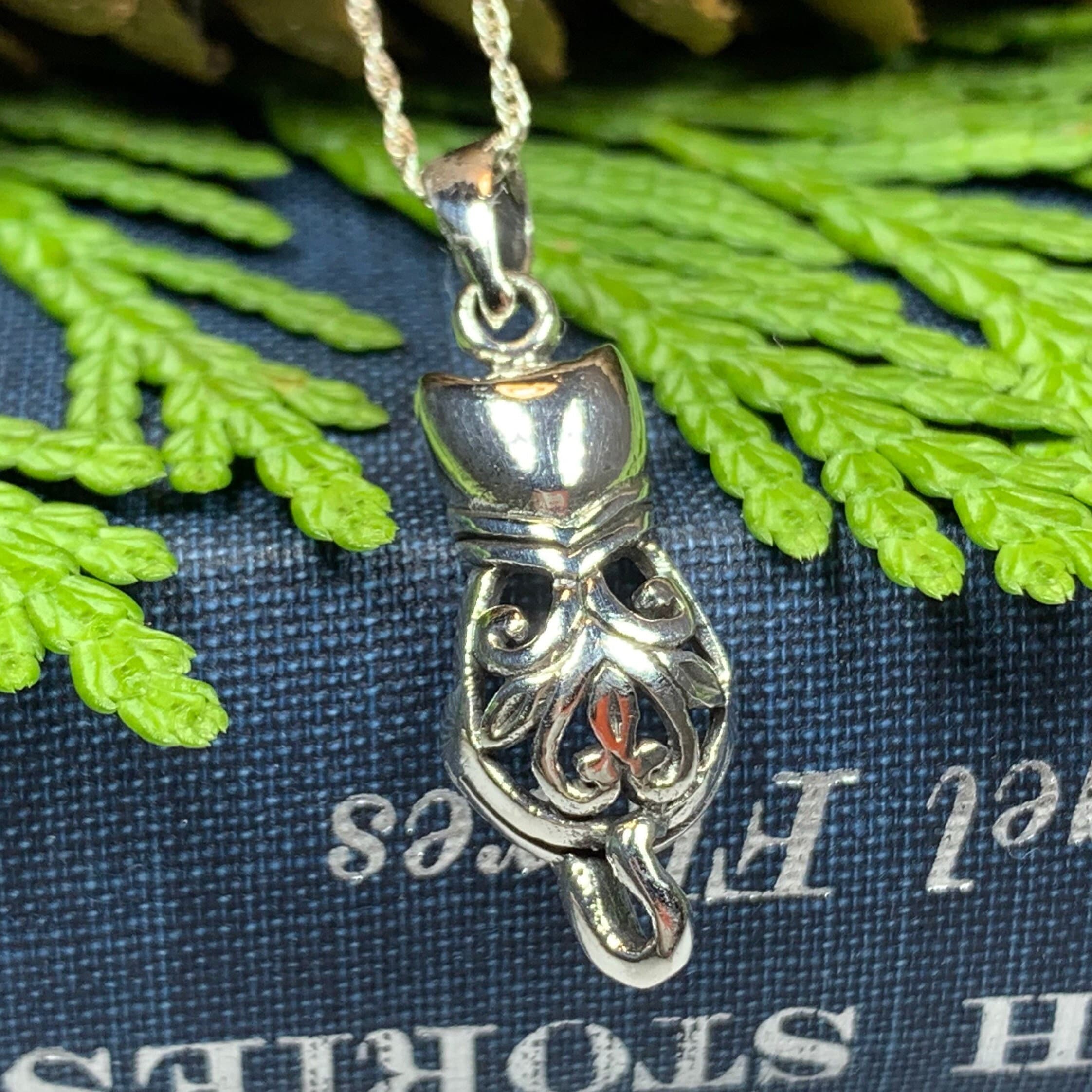 Celtic Cat Pendant Necklace by Celtic Crystal Design Jewelry, featuring intricate Celtic knot and cat motif in silver finish.
