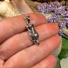 Celtic Cat Necklace pendant from Celtic Crystal Design Jewelry featuring intricate Celtic knot design and a feline motif.