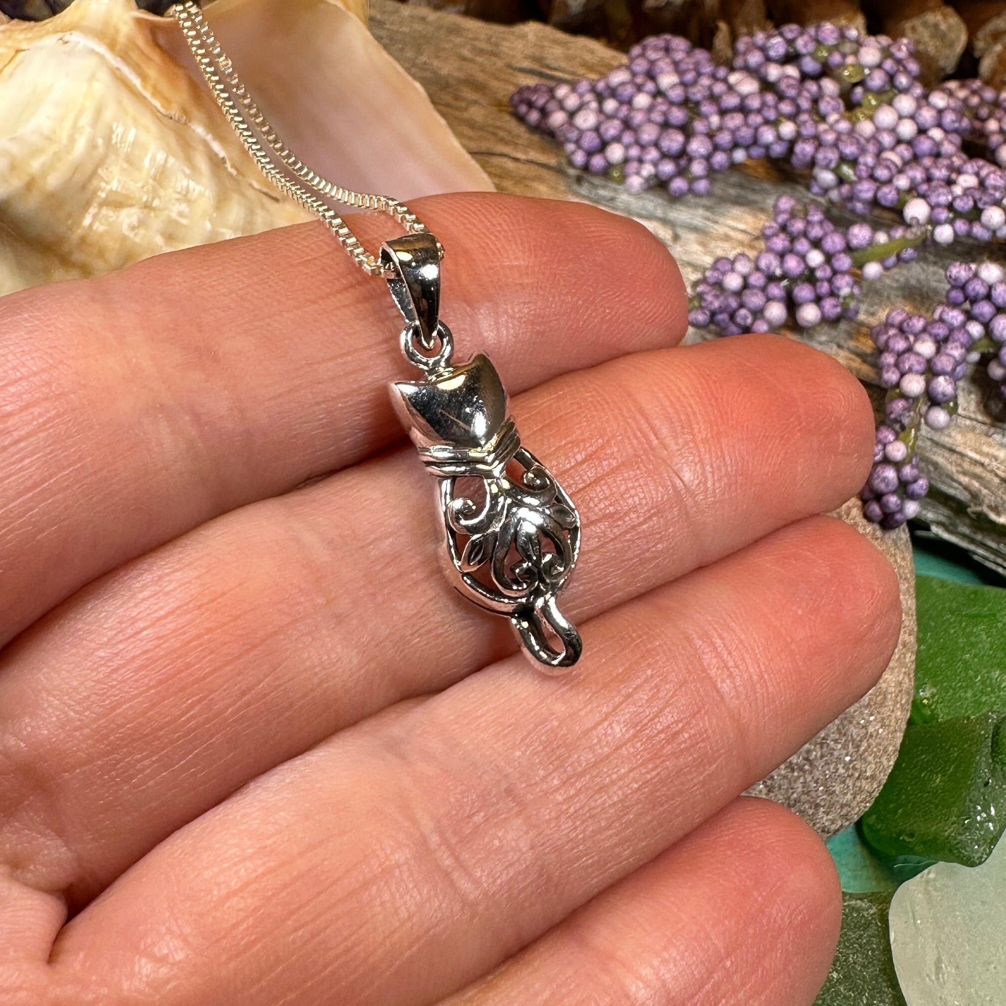 Celtic Cat Necklace pendant from Celtic Crystal Design Jewelry featuring intricate Celtic knot design and a feline motif.
