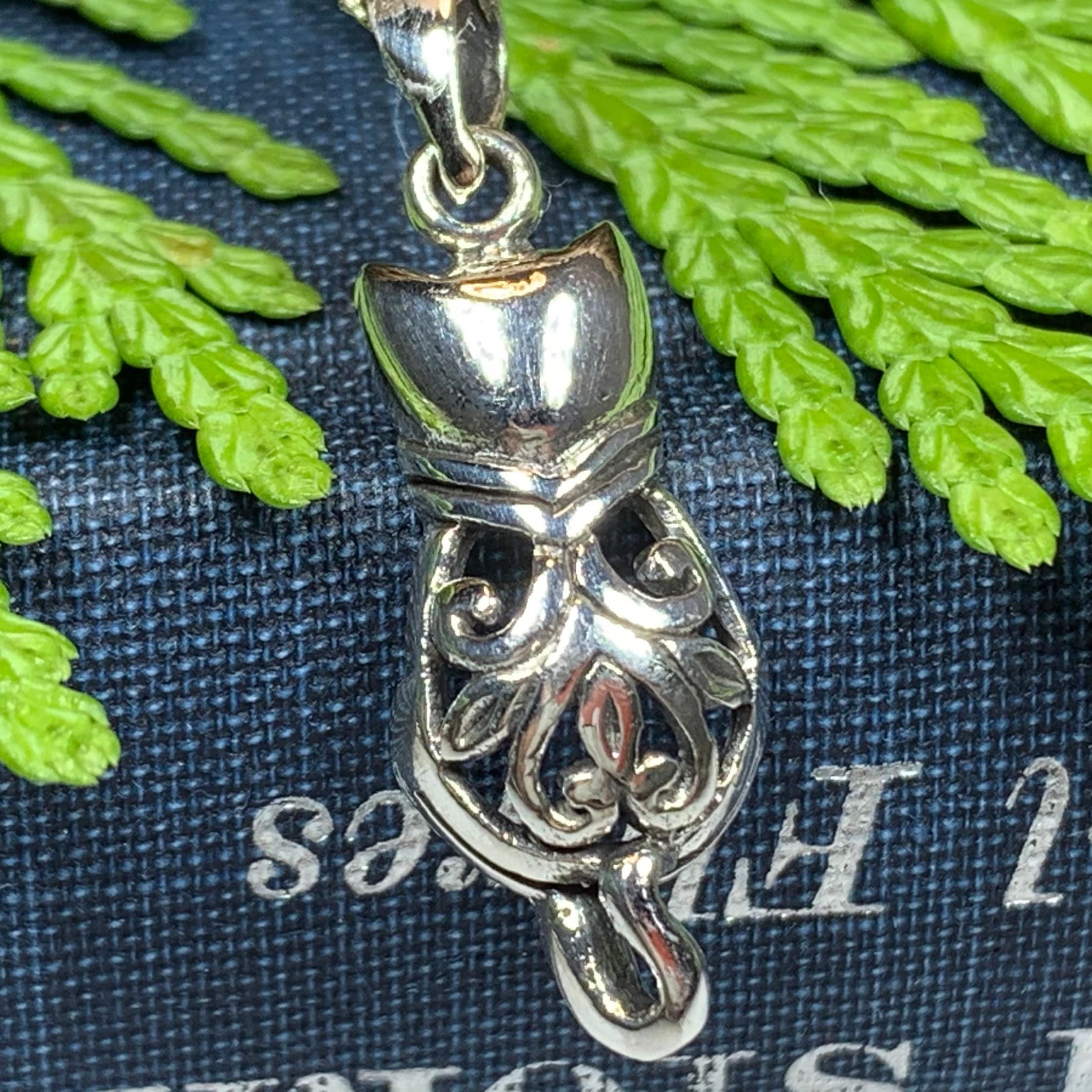 Celtic Cat Necklace pendant by Celtic Crystal Design Jewelry featuring intricate Celtic knotwork in silver.
