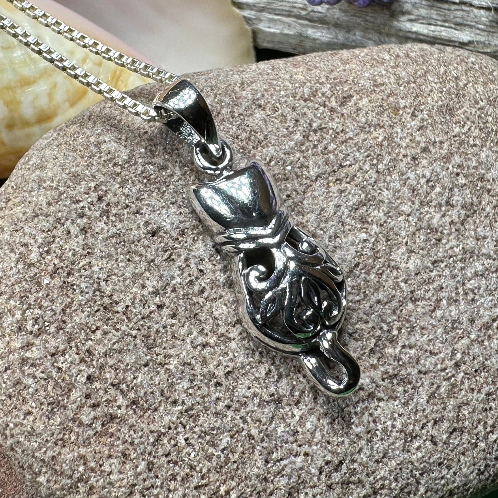 Celtic Cat Necklace pendant by Celtic Crystal Design Jewelry featuring intricate Celtic knot pattern and feline silhouette.