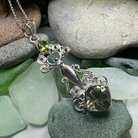 Celtic Crystal Design Jewelry Rising Goddess pendant necklace with an oval citrine gemstone, intricate Celtic-inspired detailing.