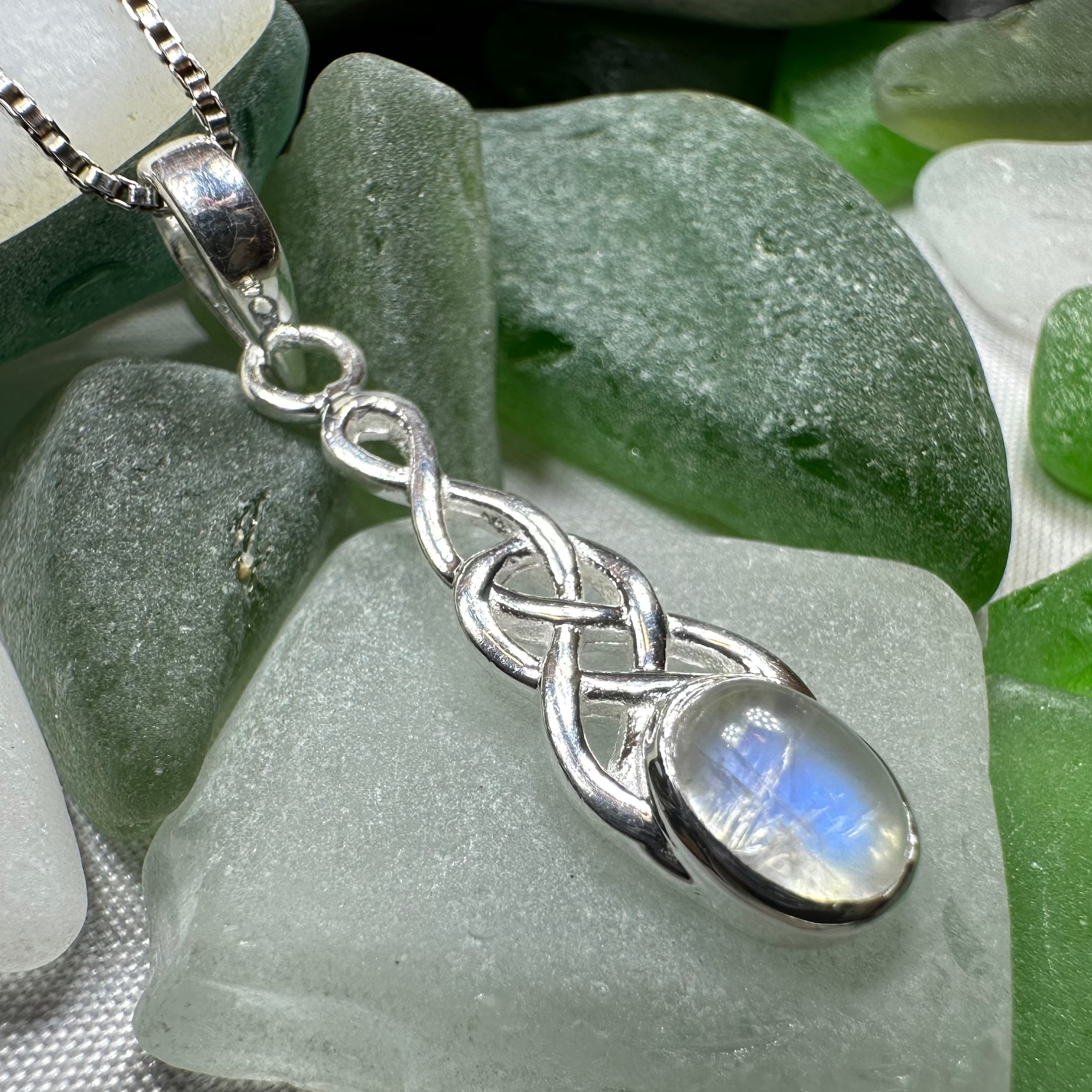 Celtic Crystal Design Jewelry Dublin Celtic Knot pendant necklace showcasing intricate knot pattern in silver-tone metal.