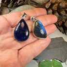 Galaxy blue Labradorite pendant necklace by Celtic Crystal Design Jewelry featuring an 18-inch extra-large gemstone with intricate Celtic detailing.
