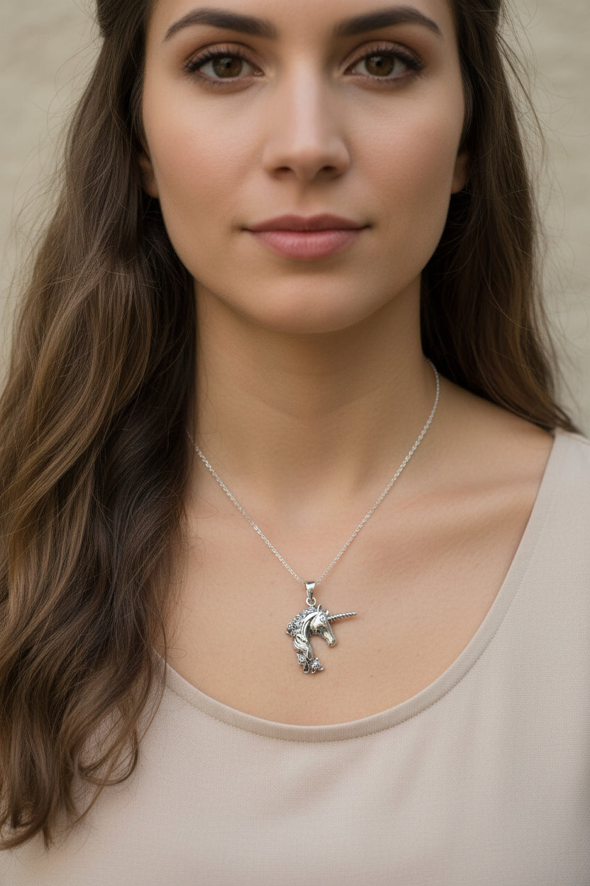 Celtic Crystal Design Jewelry Gwenllian Unicorn Necklace pendant featuring a detailed unicorn design on a silver chain.