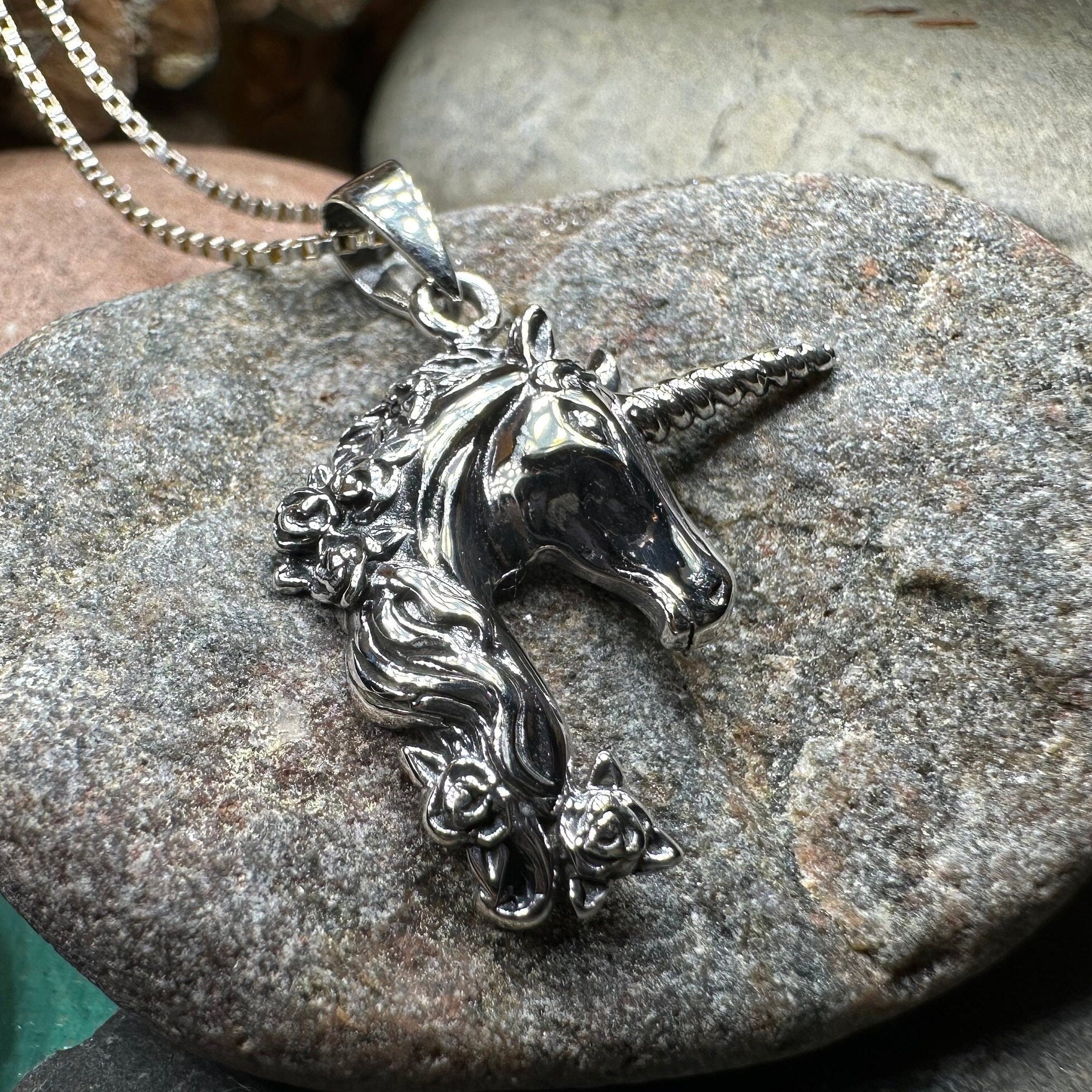 Celtic Crystal Design Jewelry Gwenllian unicorn pendant necklace featuring a detailed unicorn charm on a silver chain.