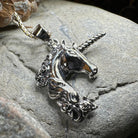 Celtic Crystal Design Jewelry Gwenllian Unicorn Necklace pendant featuring a detailed unicorn design on a silver chain.
