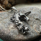 Celtic Crystal Design Jewelry Gwenllian Unicorn Necklace pendant featuring a detailed unicorn design on a silver chain.