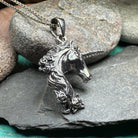 Celtic Crystal Design Jewelry Gwenllian Unicorn Necklace pendant featuring a detailed unicorn design on a silver chain.