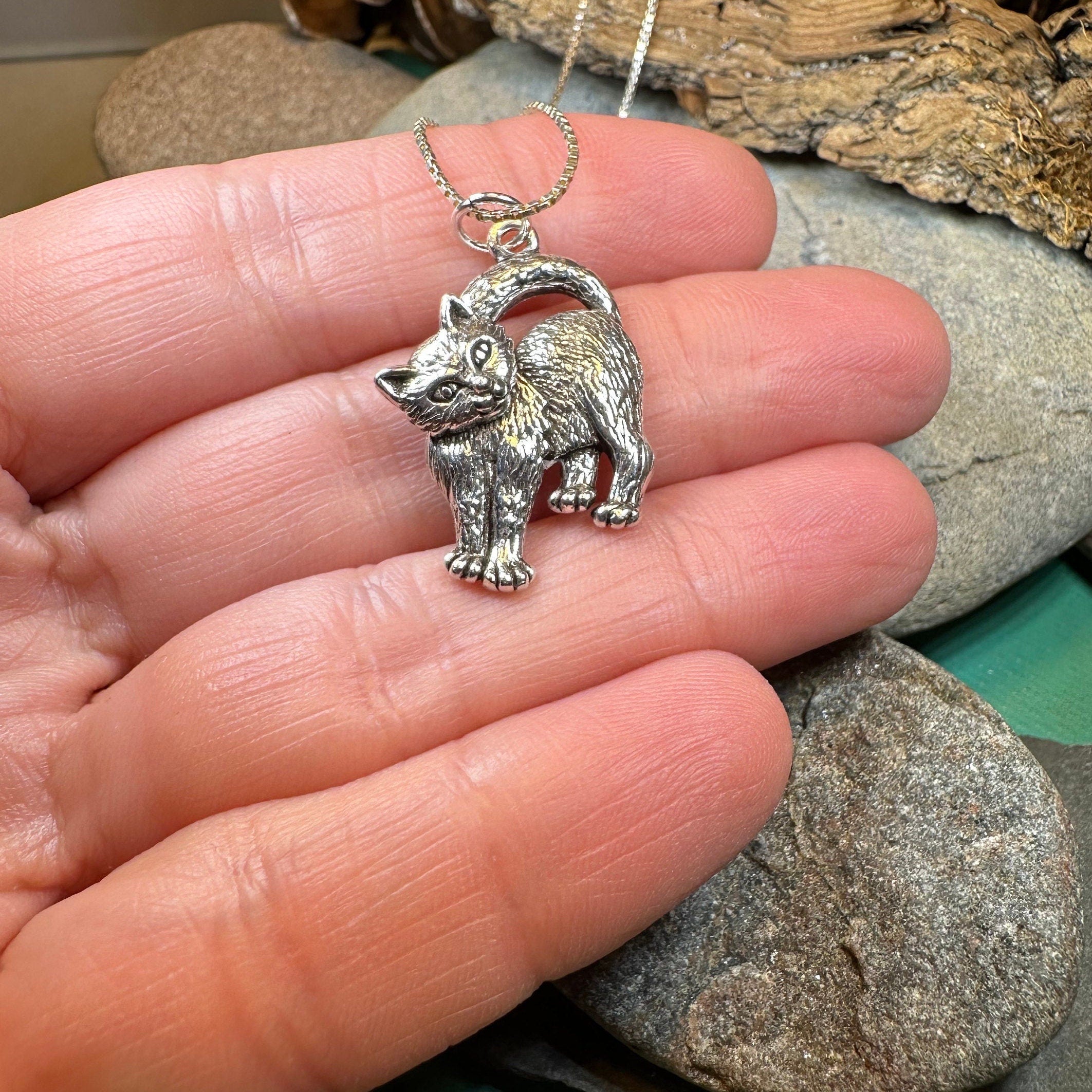 Celtic Crystal Design Jewelry Josie Cat pendant necklace featuring a detailed cat-shaped charm on a silver chain.