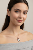Celtic Crystal Design Jewelry Josie Cat pendant necklace featuring intricate Celtic knot details and a sparkling crystal accent.