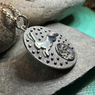 Celtic Crystal Design Jewelry Moonjumper Rabbit pendant necklace with intricate silver detailing and a whimsical rabbit design.