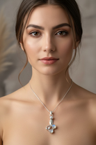 Celtic Crystal Design Jewelry Misty Morning Moonstone Owl Pendant with topaz accents, showcasing intricate owl design and moonstone gemstone.