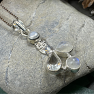 Celtic Crystal Design Jewelry Misty Morning Moonstone Owl Pendant with topaz accents, showcasing intricate craftsmanship and mystical charm.