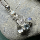 Celtic Crystal Design Jewelry Misty Morning Moonstone Owl Pendant with topaz accents, intricate craftsmanship, and detailed owl design.