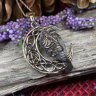 Celtic Raven pendant necklace from Nightwatcher by Celtic Crystal Design Jewelry, featuring intricate Celtic knotwork and a raven motif.