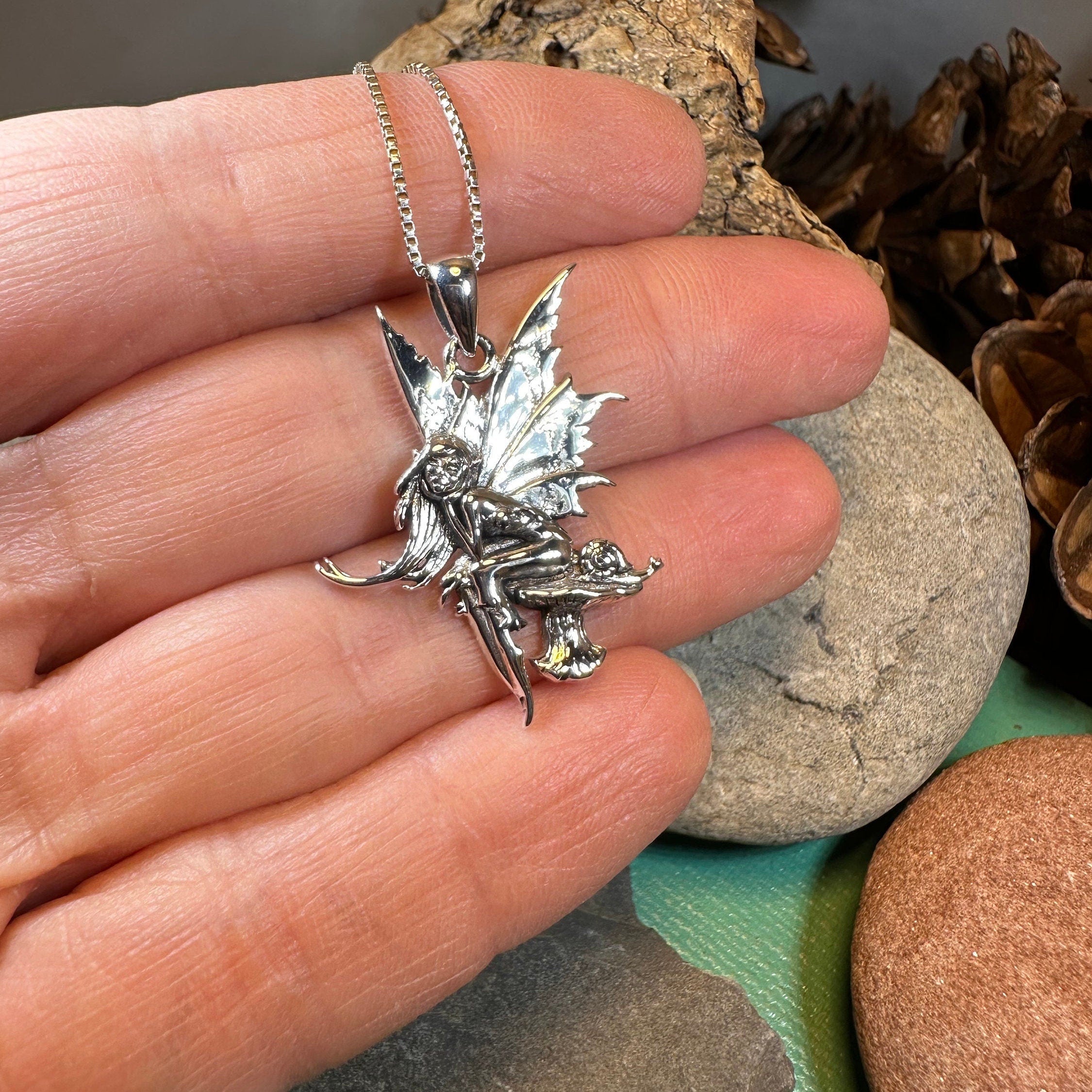 Celtic Crystal Design Jewelry Toadstool Fairy Necklace pendant with intricate fairy and mushroom design, crafted in silver.