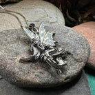Celtic Crystal Design Fairy Necklace pendant featuring a detailed toadstool fairy charm, crafted in silver-tone metal.
