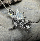 Celtic Crystal Design Jewelry Toadstool Fairy Pendant necklace with intricate fairy and mushroom motifs, silver-tone metal.
