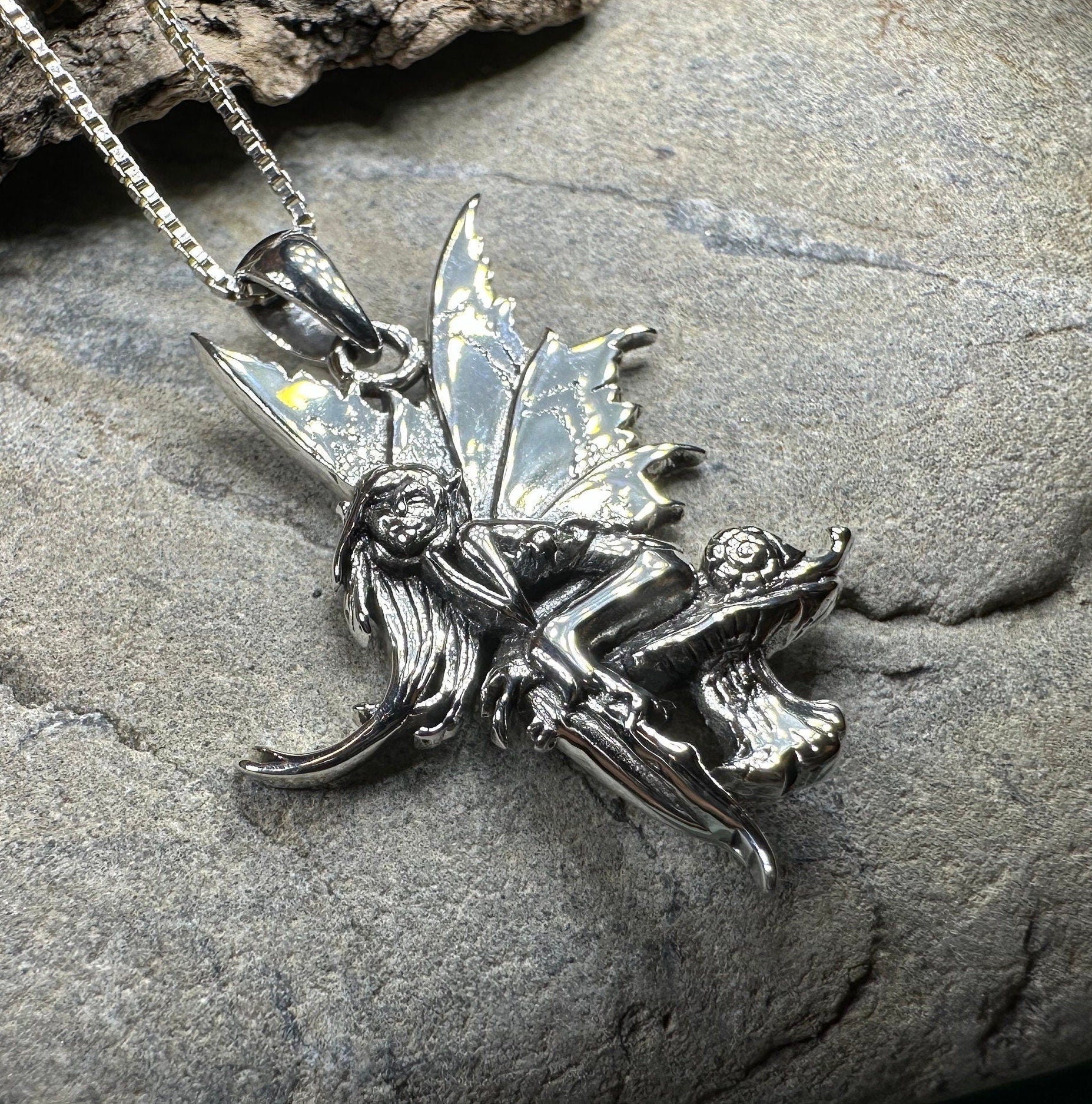Celtic Crystal Design Jewelry Toadstool Fairy Pendant necklace with intricate fairy and mushroom motifs, silver-tone metal.