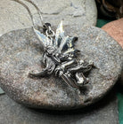 Celtic Crystal Design Jewelry Toadstool Fairy Necklace pendant with intricate fairy and mushroom design on a chain.