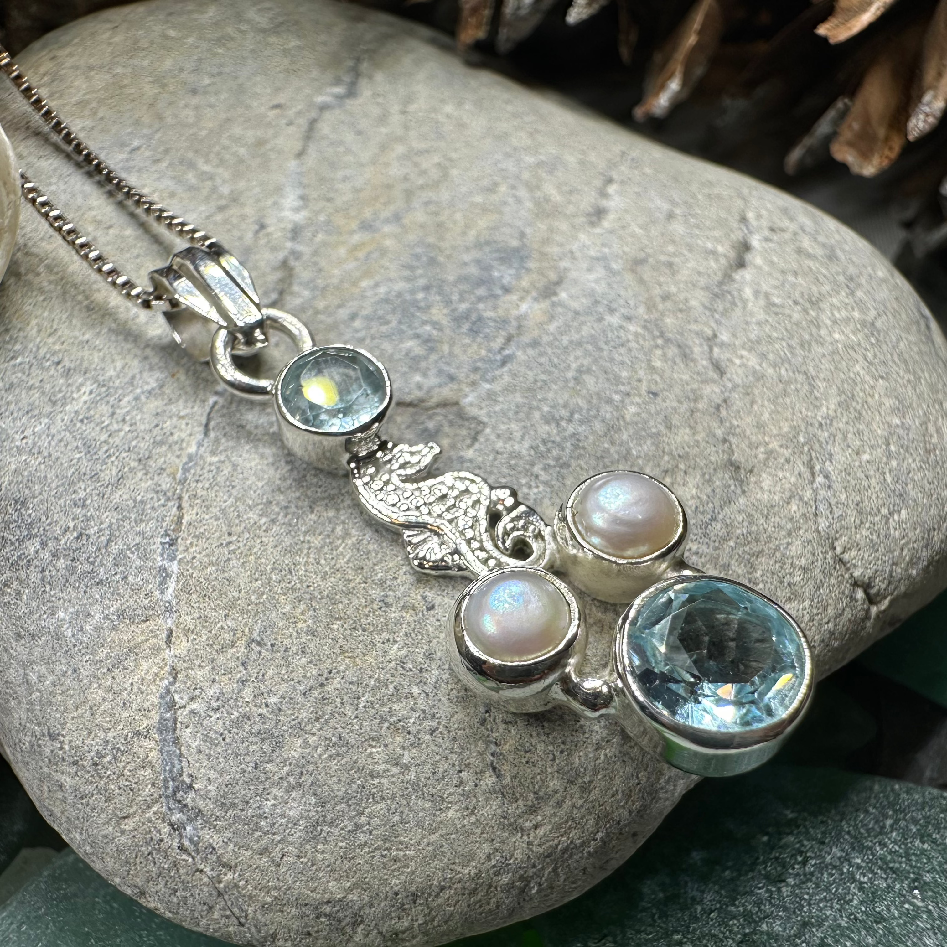 Celtic Crystal Design Jewelry Seamist Seahorse Pendant necklace with topaz and amethyst gemstones, intricate seahorse design.