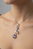Celtic Crystal Design Seahorse Necklace pendant with topaz and amethyst gemstones, featuring a detailed seahorse design.