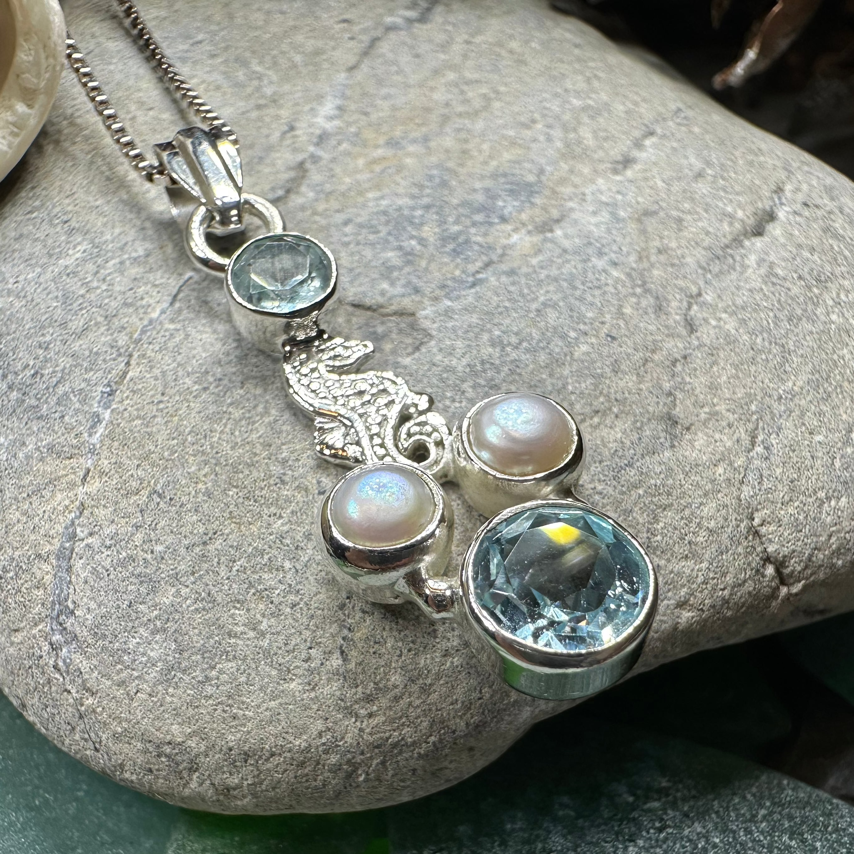 Celtic Crystal Design Jewelry Seamist Seahorse Pendant necklace featuring topaz and amethyst gemstones on a delicate chain