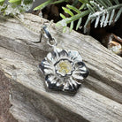 Celtic Crystal Design Jewelry Welsh Daffodil pendant necklace with intricate floral detailing and silver chain.