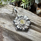 Celtic Crystal Design Jewelry Welsh Daffodil pendant necklace featuring a detailed floral Celtic motif on a silver chain.