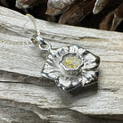 Celtic Crystal Design Jewelry Welsh Daffodil pendant necklace featuring a detailed floral Celtic motif in silver.