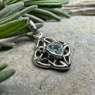 Amethyst Celtic Knot pendant necklace by Celtic Crystal Design Jewelry featuring a detailed Celtic knot design on an 18-inch chain.