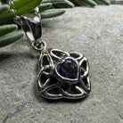 Amethyst Celtic Knot pendant necklace by Celtic Crystal Design Jewelry featuring a detailed Celtic knot design and purple gemstone.