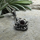 Amethyst Celtic knot pendant necklace by Celtic Crystal Design Jewelry featuring an intricate Celtic knot design.