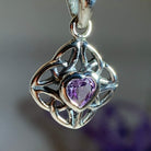 Amethyst Celtic knot pendant necklace by Celtic Crystal Design Jewelry featuring an intricate Celtic knot design.