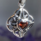 Ashley Celtic Knot Necklace pendant with purple amethyst gemstone, Celtic Crystal Design Jewelry, intricate Celtic knot detailing.