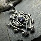 Amethyst Luckenbooth pendant necklace by Celtic Crystal Design Jewelry featuring a detailed Celtic knot design and purple amethyst stone.