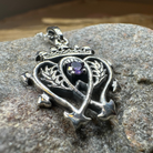 Amethyst Luckenbooth pendant necklace by Celtic Crystal Design Jewelry, featuring a detailed Celtic knot design with a purple amethyst gemstone.