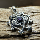 Celtic Crystal Design Jewelry Amethyst Luckenbooth pendant necklace with intricate Celtic knot details and a polished purple amethyst gemstone.