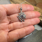 Amethyst Luckenbooth pendant necklace by Celtic Crystal Design Jewelry featuring a detailed Celtic design and purple amethyst gemstone.