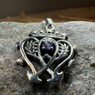 Celtic Crystal Design Jewelry Amethyst Luckenbooth pendant necklace with intricate Celtic knot details and a polished purple amethyst stone.
